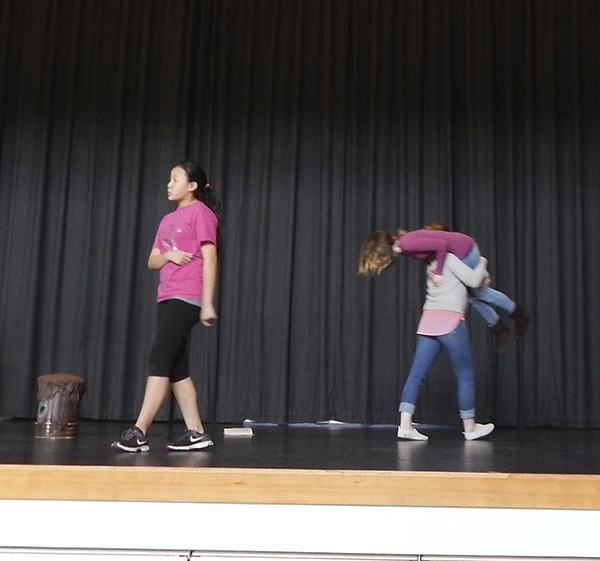 Maya Trettevik rehearses her character Captain Banana as another performer gets carried away!