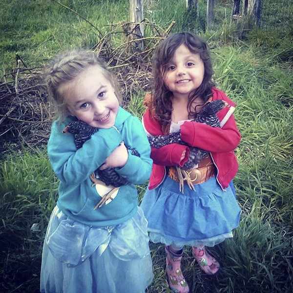Girls and their chickens ....