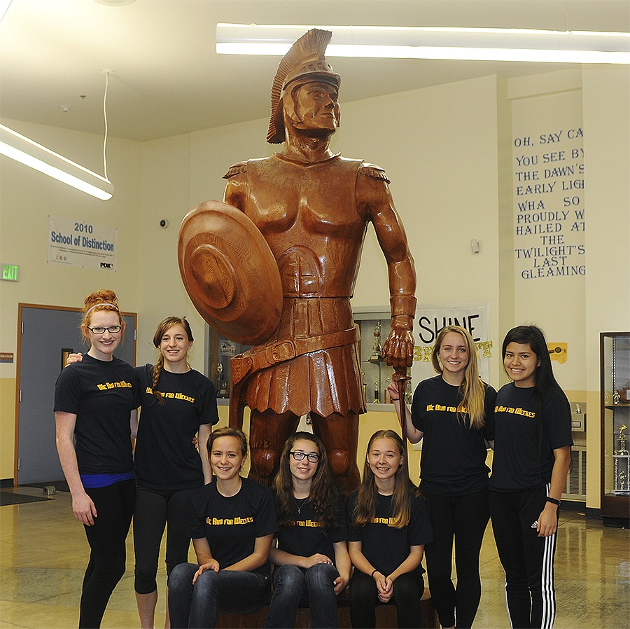 The Spartan girls Cross Country team, Evergreen League champs, are pictured here just before leaving for the District meet Friday, Oct 28, held Saturday morning in Woodland. Pictured here from left are Brynn Peterson, Marissa Bailey, Chelsea Biciuans, Madison Carlson, Madelyn Archibald, Kayleen Bailey, and Enid Ensastegui. Photo by Lonnie Archibald