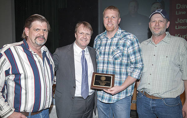 This photo was taken during the BPA Administrators Excellence Awards ceremony on March 16 in Portland. Jeremy Jackson is holding the award and standing next to BPA Administrator, Elliot Mainzer.                                David Reynolds is on the left of Ellliot Mainzer, Kurk Shriver is to the right of Jeremy Jackson. Submitted Photo