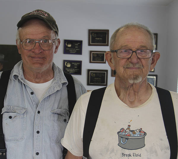 Rene Davis, on the left, has lived in Bear Creek since 1955, Gene “Munchie” Halvorson is on the right. Their main concern about being in the parade? They asked, “Do we have to dress up?” Fearing they would back out … I said, “NO.” Photo Christi Baron