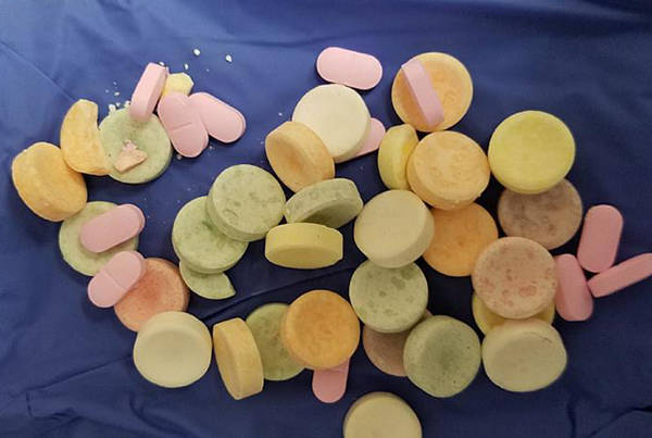 Drug-laced “Smarties” and pills confiscated earlier this week by the Forks Police Department. Submitted photo