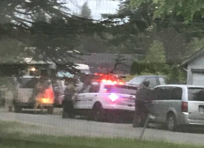 Just before dawn law enforcement took action at a residence on G Street in Forks. Submitted Photo