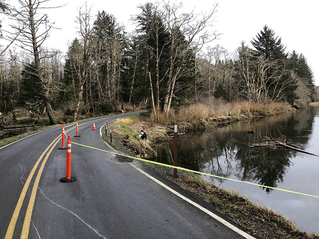 During the government shutdown, the Quillayute River was working to eat away the bank along the road to Rialto Beach.                                Photos by John Leavitt