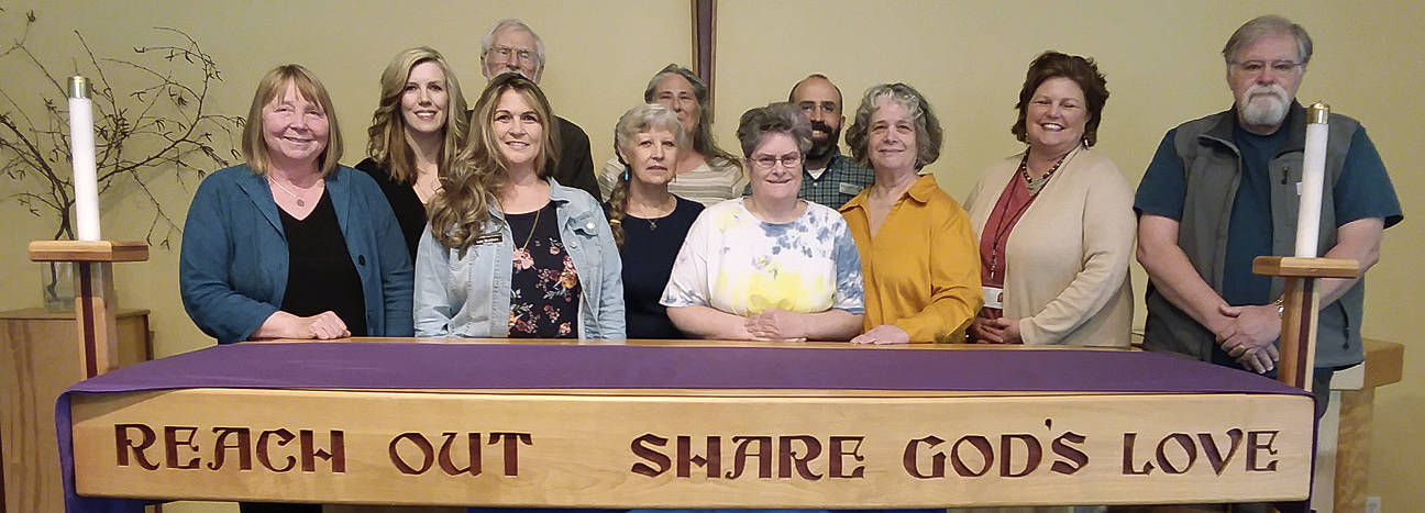 Recipients were, from left, Nita Lynn, representing First Step Family Support Group programs in Sequim, Port Angeles, Forks, Neah Bay, Brinnon and Port Hadlock; Shauna Rogers, of Clallam-Jefferson Pro Bono Lawyers; Lori Brothers, of North Olympic Foster Parent Association; Jerry Enzenauer (behind Brothers), board chair for the Dungeness Homes low-income housing program in development in Sequim; Susan Hillgren, The Answer for Youth; Ann Simpson (behind Hillgren), Forks Abuse Program; Beth Walker and Catherine McKinney, Clallam Mosaic; Pastor Russ Britton (back row), Dungeness Valley Lutheran Church; Rebekah Miller, Peninsula Behavioral Health; and John Braasch, Voices for Veterans. Healthy Families of Clallam County also received a donation. Submitted photo