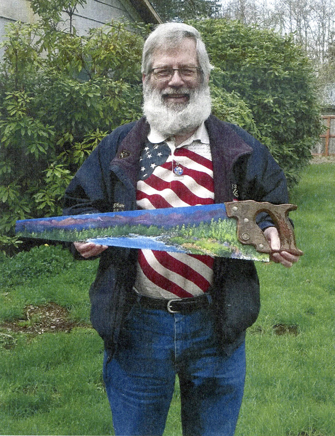 Gold Star Families Memorial board member Bill Plumley has donated a hand painted saw to be raffled with funds raised to benefit the monument project. Tickets are $1 and the drawing will be held after the monument’s groundbreaking ceremony at the Forks Transit Center scheduled for June 29, 2019. The Northwest Navy Band will be on hand for that ceremony. Submitted photo
