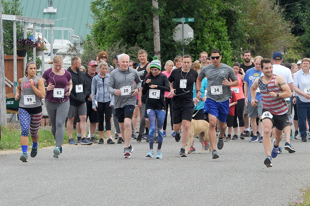 Children, adults, and even a dog participated in the annual Forks 4th of July Fun Run organized by Spartan head basketball coach Rick Gooding to benefit the FHS basketball program. Levi Larson of Forks won the 10K while Adison White of Utah won the 5K race. Photo Rick Gooding