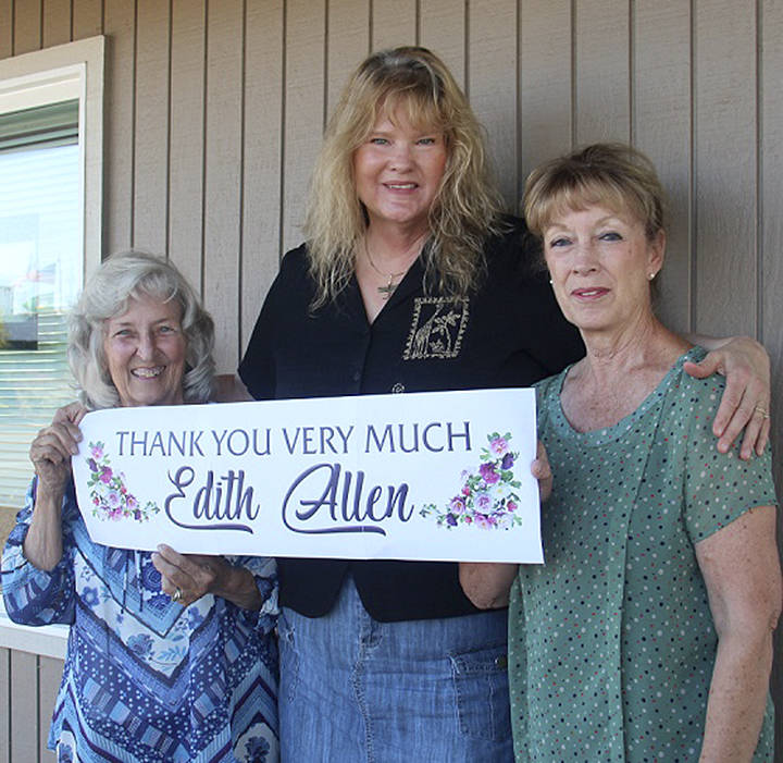 Former Bogachiel Garden Club co-presidents Judi McClanahan and Kris Ayers thank Mary Ulin for donating her mothers gardening books to the club. Photo Christi Baron