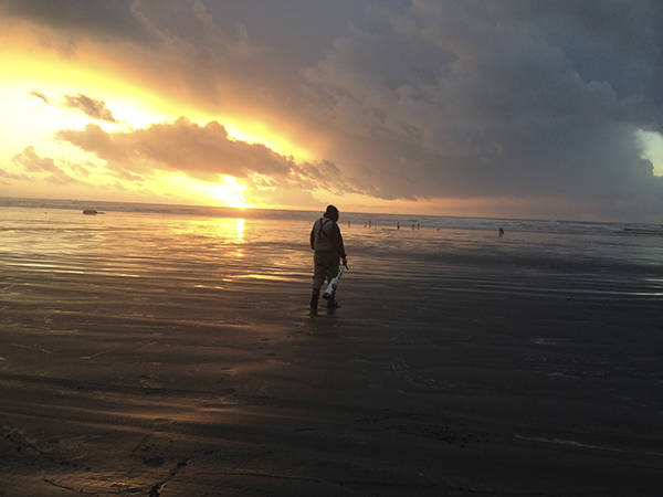 Clamming at sunset. Photo Becky Volk