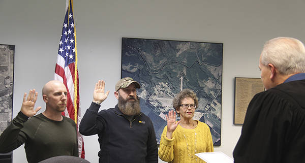 Jeff Gingell, Mike Gilstrap, and Juanita Weissenfels were sworn in by Judge Erik Rohrer Monday evening in the Forks City Council Chambers. Photo Christi Baron