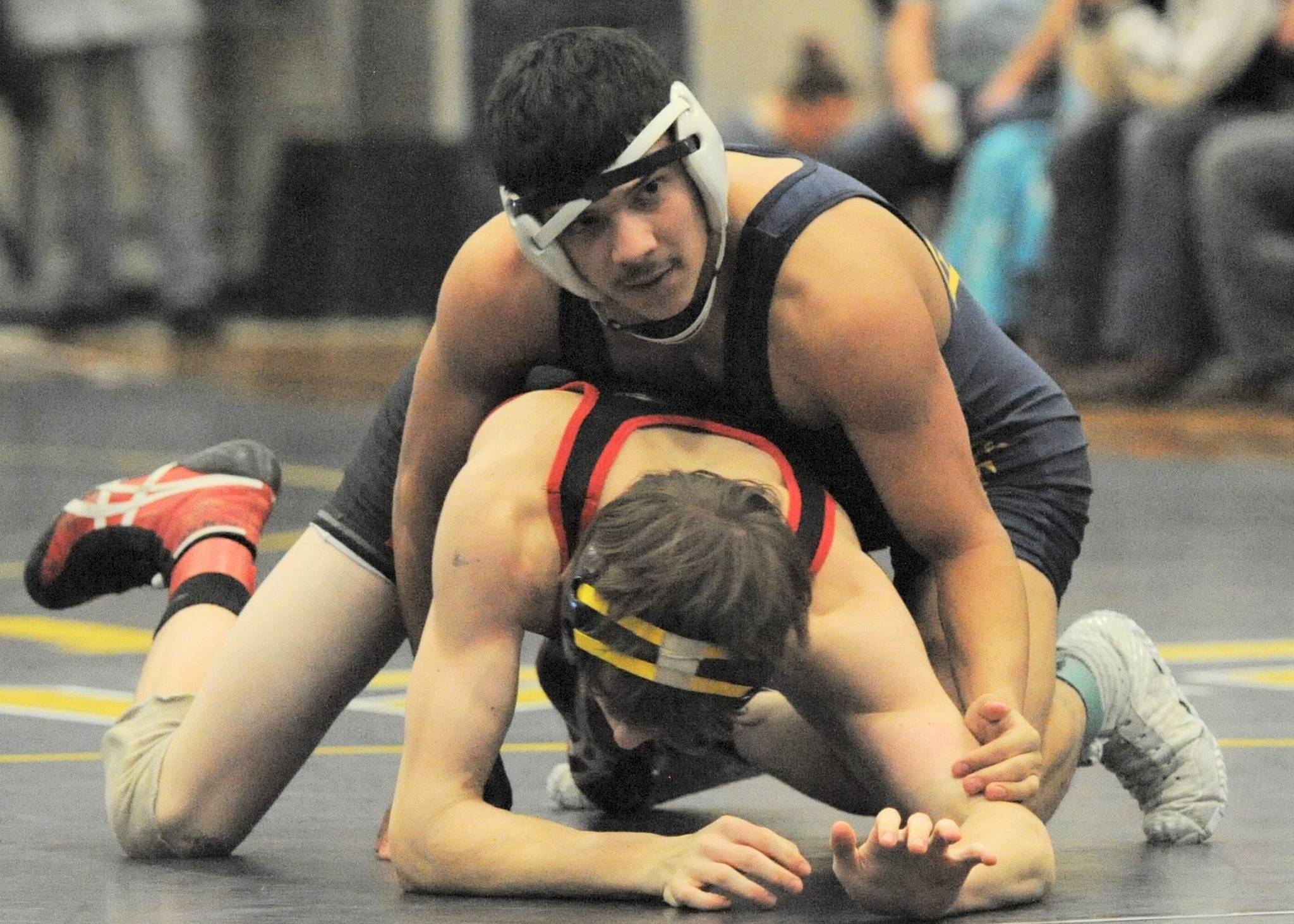 Pictured here in the Evergreen 1A league championships is Ariel Morales who won by a pin. Morales went on to place 5th at state. photo by Lonnie Archibald