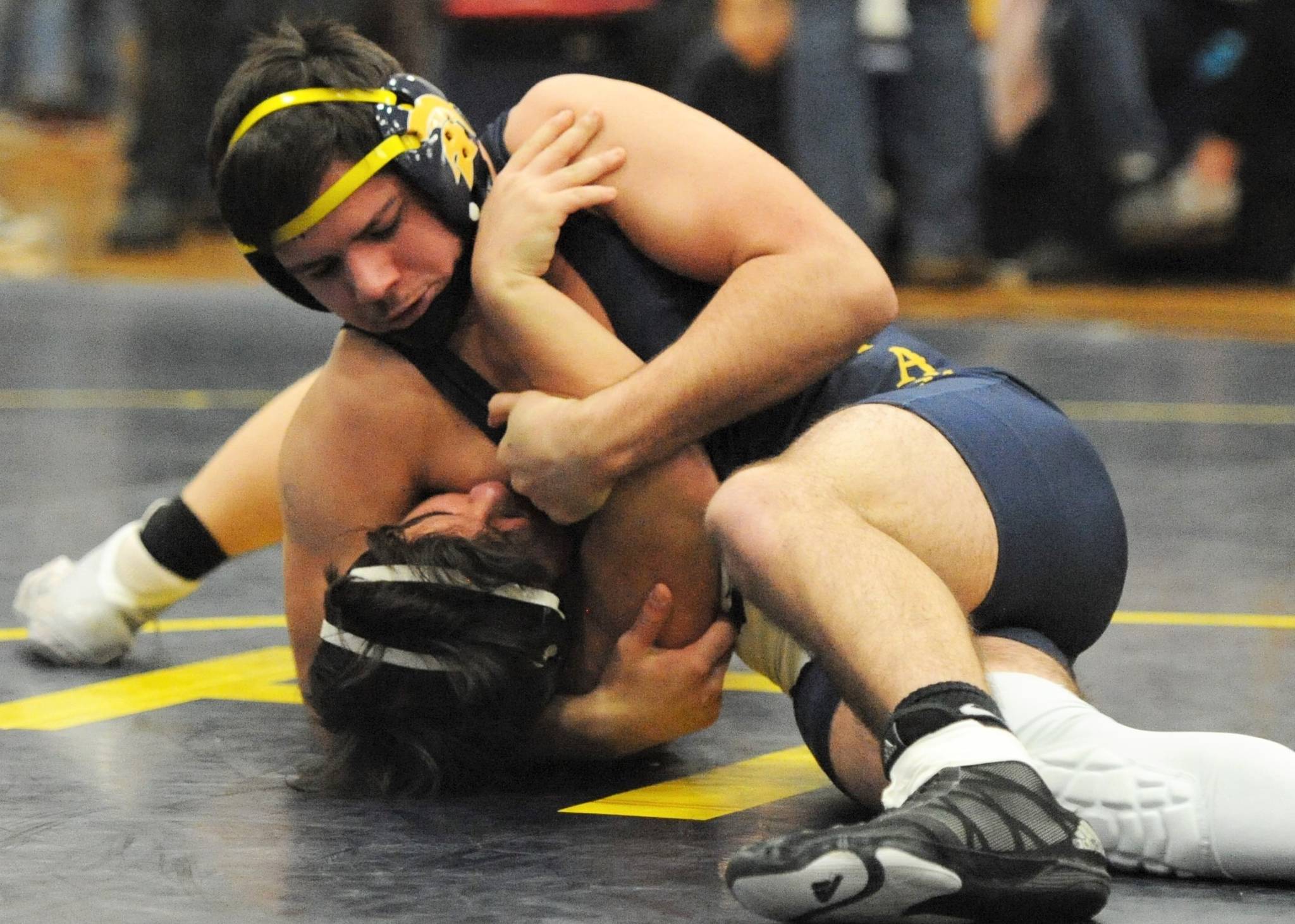 Hayden Baker pictured here during the Evergreen 1A league championships sinning by a pin placed 3rd at State. Photo by Lonnie Archibald