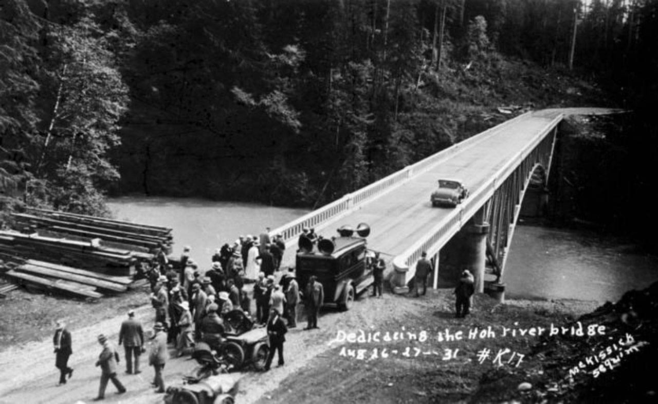 The Hoh Bridge officially opened with fanfare Aug. 26-27, 1931, as the Olympic Loop was completed. Hundreds of vehicles stopped in Forks before motoring on to Kalaloch for a big celebration. (Forum archive photo)
