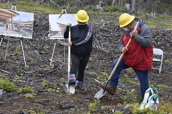 Quileute Tribal School Board Vice-Chair Charlotte Penn and Quileute Tribal Council Chairman Doug Woodruff, Jr. break ground. Photos Quileute Tribe