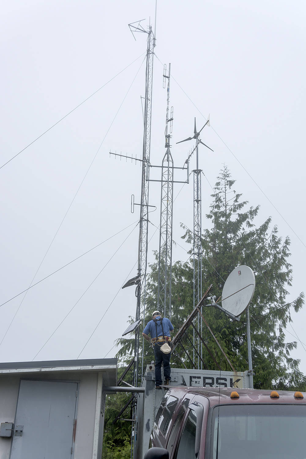 Clallam County Amateur Radio Club member Chuck Stroeher recently worked in preparation for installing three new antennas for the amateur radio repeater that will be moving to this site. Chuck was accompanied by three other members of the club who worked as the ground crew and support while Chuck was up in the air. Forks Community Hospital is the leaseholder of the site and is adding the Clallam County Amateur Radio Emergency Service as part of their emergency preparedness program. More information will be released when the installation is complete and operational. Photos Dave Youngberg