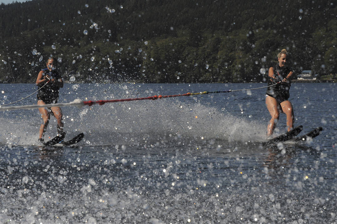 Brad Graybill of Forks took his twin daughters to Lake Pleasant over the Labor Day weekend where they enjoyed the cooling bubbles while skiing on this hot summer’s day. Friday and Saturday were busy days for outdoor enthusiasts on the popular lake. Monday however brought too much wind with most boaters, swimmers, and kayakers shying away from the rough waters. Photo by Lonnie Archibald