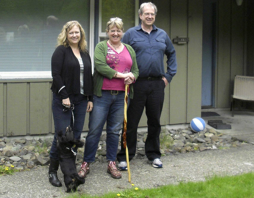 Hanify “kids” and Conan the dog visited their former home, a few years ago, at the Hoh Ranger Station. Laura, Carol, and Bruce visit the Hoh as often as they can. Photo Christi Baron
