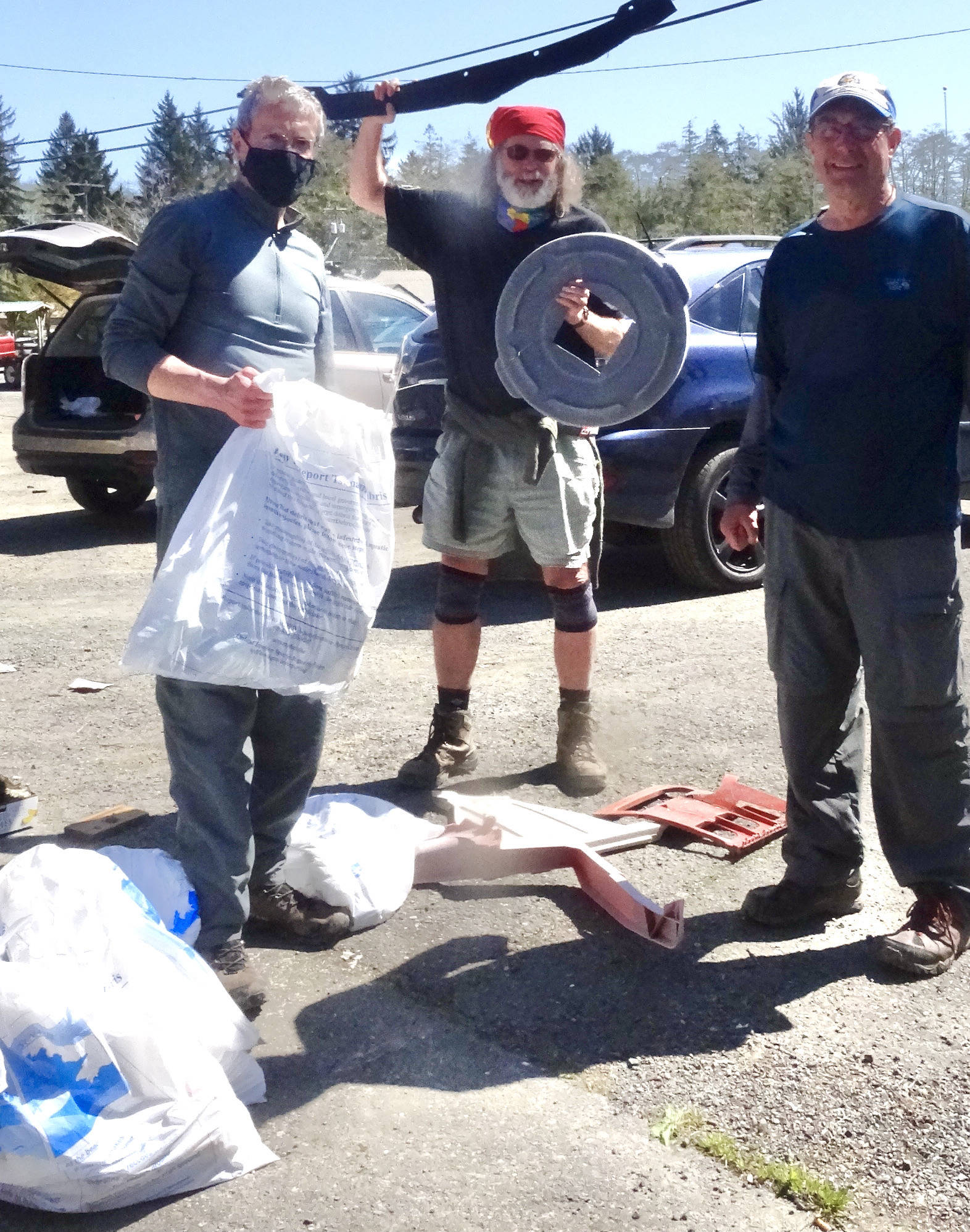 Three volunteers from Oregon, Bob, Mark, and Randy, camped at Cape Alava and drove to Pillar Point to pick up marine debris.