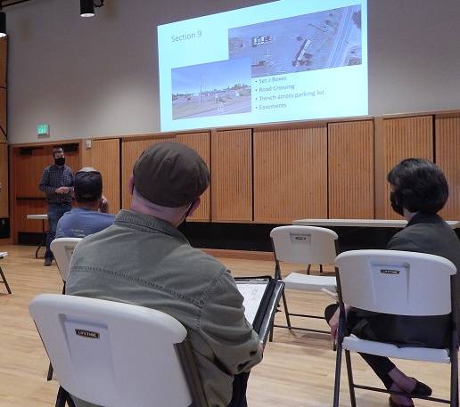 Colin Young, PE, Distribution System Supervisor with the Clallam County PUD shares a PowerPoint detailing the underground project on Forks Avenue. Photo Christi Baron