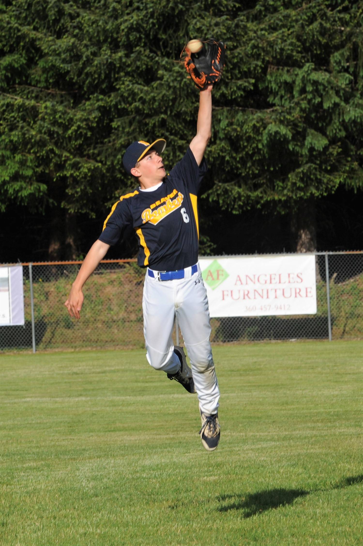 Beaver shortstop Alex Pursley made this leaping catch of a line drive for an out against Forks. Photo by Lonnie Archibald