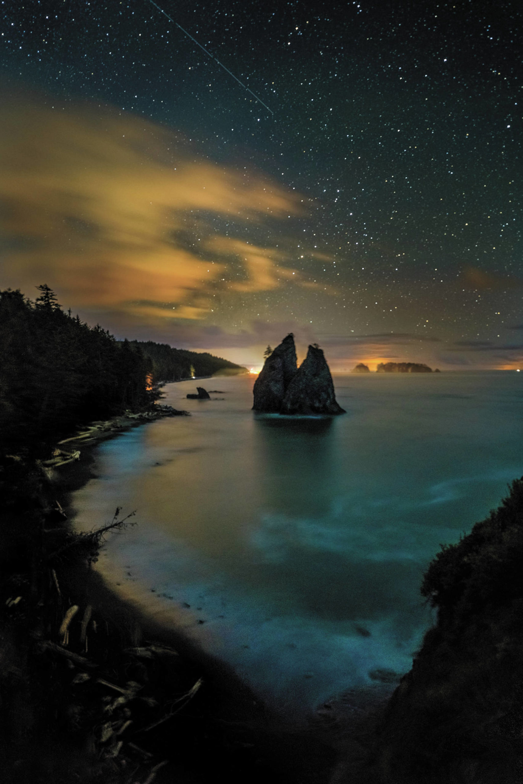 About this photo from Hole in the Wall Matt said, “This may be my favorite shot of the bioluminescence I have taken thus far. This shot took so much planning and patience, arriving before sunset, then waiting out the high tide to hike back at 3 a.m.… Everything lined up just right so that I got the shot with the glowing blue waves on only my second attempt. It was truly a spectacular night and worth every bit of the struggle to capture this iconic spot in a truly unique light. If you can’t tell I am obsessed with the “bio-blue.” Photos Matt Nichols