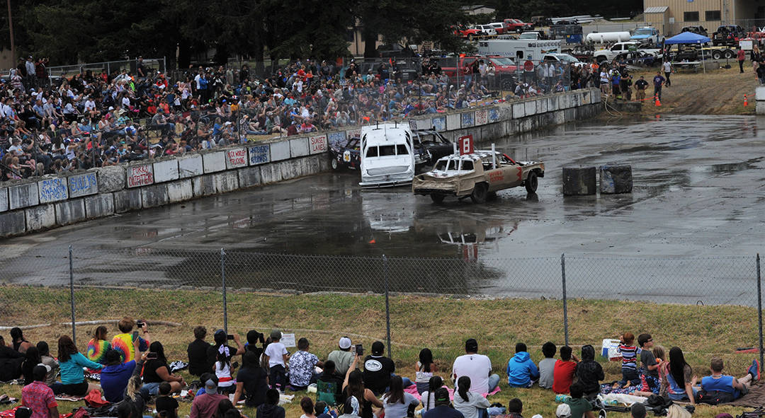 A large number of Demo fans turned out to root for their favorite cars and drivers at this year’s 4th of July Demo Derby. Photo by Lonnie Archibald.