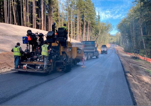 Source: FHWA - Paving asphalt on Upper Hoh Rd approaching the Canyon Creek bridge.