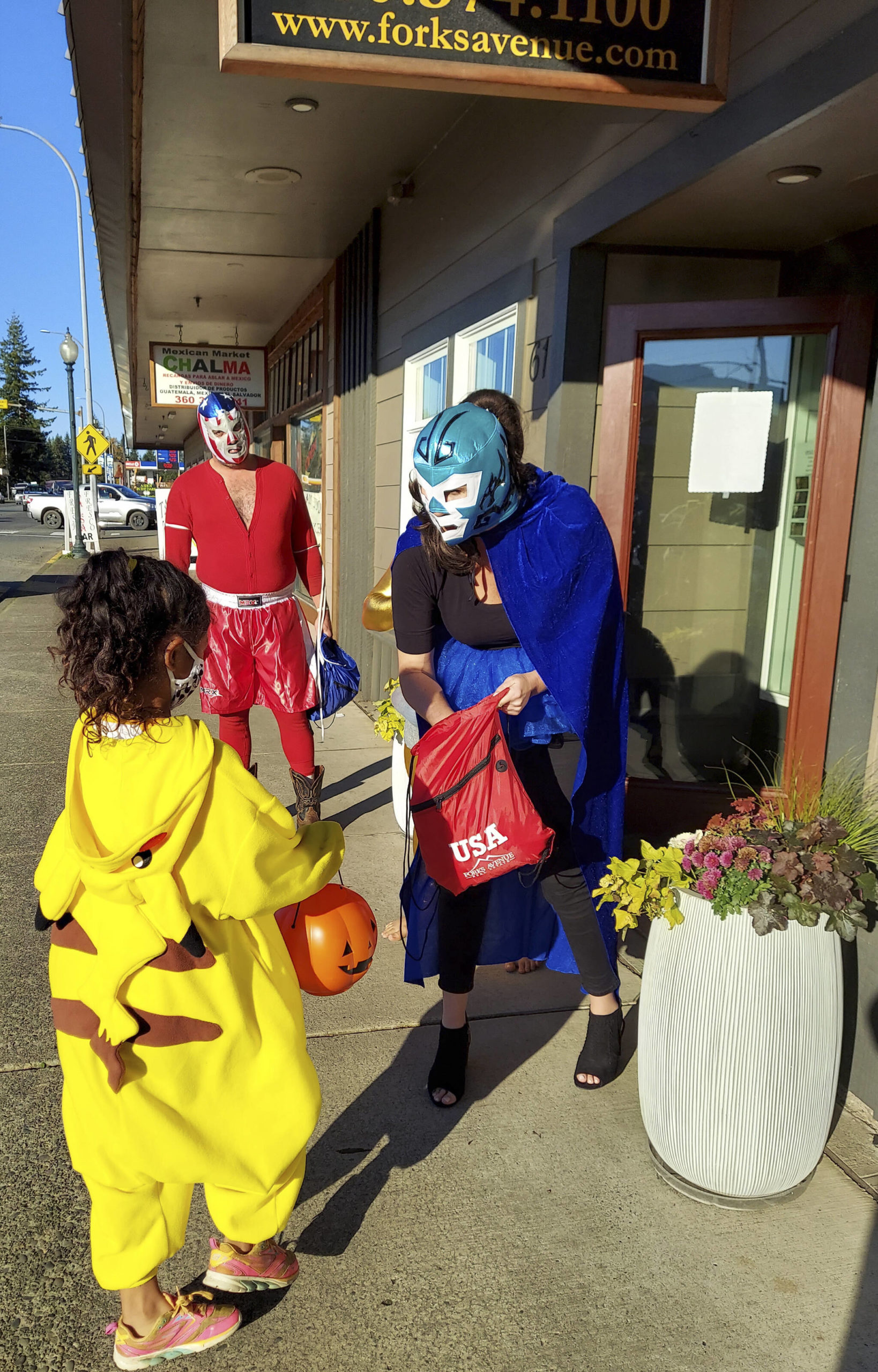 Forks Avenue had some fun wrestlers handing out candy. Submitted Photo