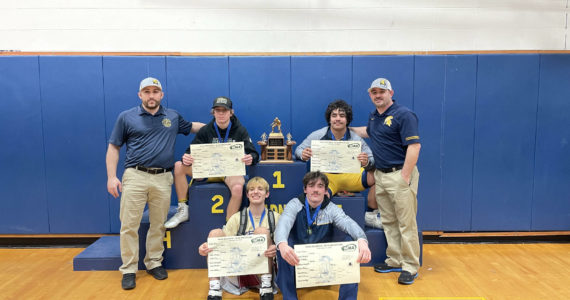 Regionals champs Individual photo from left to right: Coach Frishkorn, Conner Demorest, Sloan Tumaua, Coach Weakley (sitting) Jake Weakley, Hayden Queen.