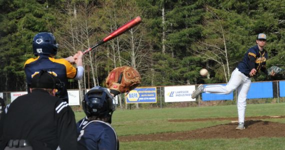 Spartan pitcher Logan Urvina delivered the pitch which was hit to second baseman Dalton Kilmer who in turn threw to Gunner Rogers at first for the out. Catching is Spartan Keaton Northcut. Forks took both games of the doubleheader with 19 to 3 and 13 to 11 wins. Photo by Lonnie Archibald (Final scores were uncertain at press time)