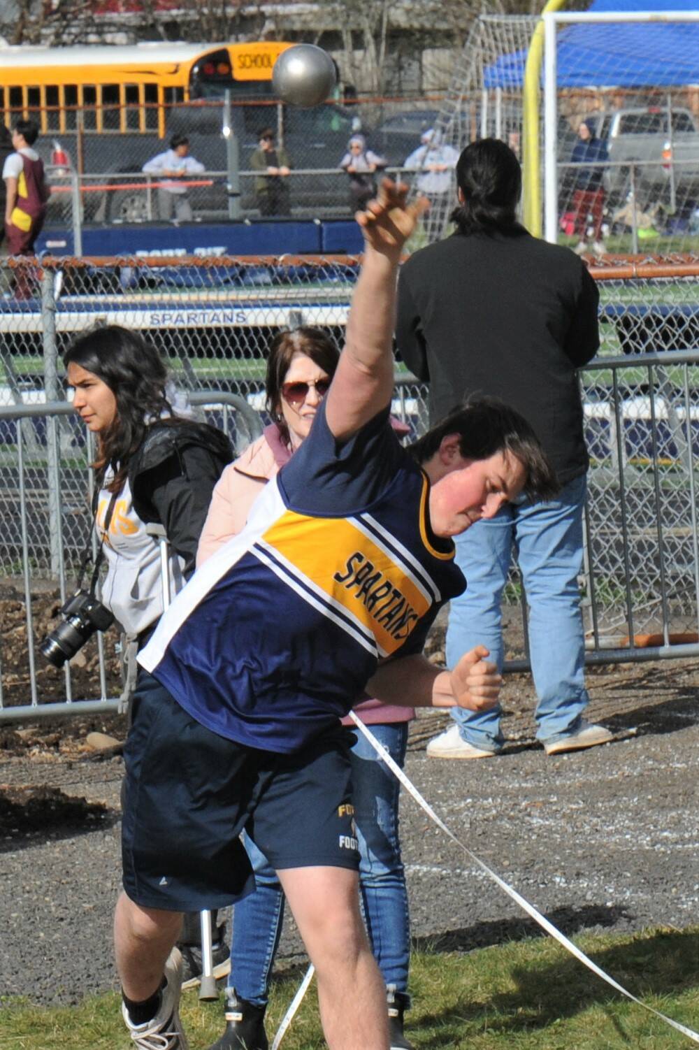 Matthew Wallerstedt in the shot put competition. Photo by Lonnie Archibald