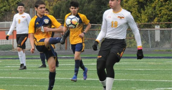 Spartan Jesus Garcia-Dominguez who scored four goals against Eatonville which Forks defeated 6 to 3 Friday, April 1 was getting his kicks against Winlock who Forks defeated 2 to 0 Saturday, April 2 at Spartan Stadium. Looking on is Arturo Dominguez-Gomez. Photos by Lonnie Archibald