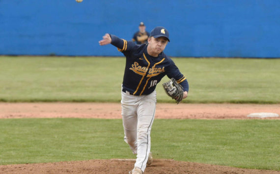Forks’ Logan Olson pitches a shutout against Ilwaco in the Southwest 2B district tournament Friday. Olson finished with nine strikeouts in a 7-0 win. (Jordan Nailon/Longview Daily News)