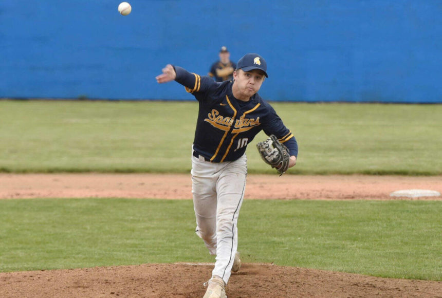 <p>Forks’ Logan Olson pitches a shutout against Ilwaco in the Southwest 2B district tournament Friday. Olson finished with nine strikeouts in a 7-0 win. (Jordan Nailon/Longview Daily News)</p>