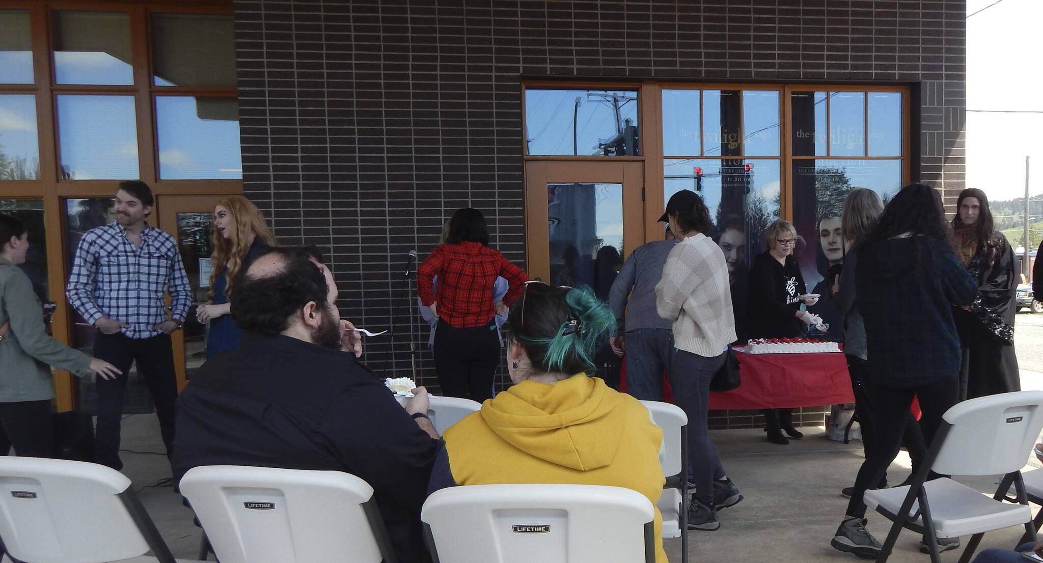 Some unsuspecting Twilight fans/visitors got in on some cake along with local cosplayers Rosalie Hale, Chief Charlie Swan, and Marcus Volturi as well as a few locals.Photo Christi Baron