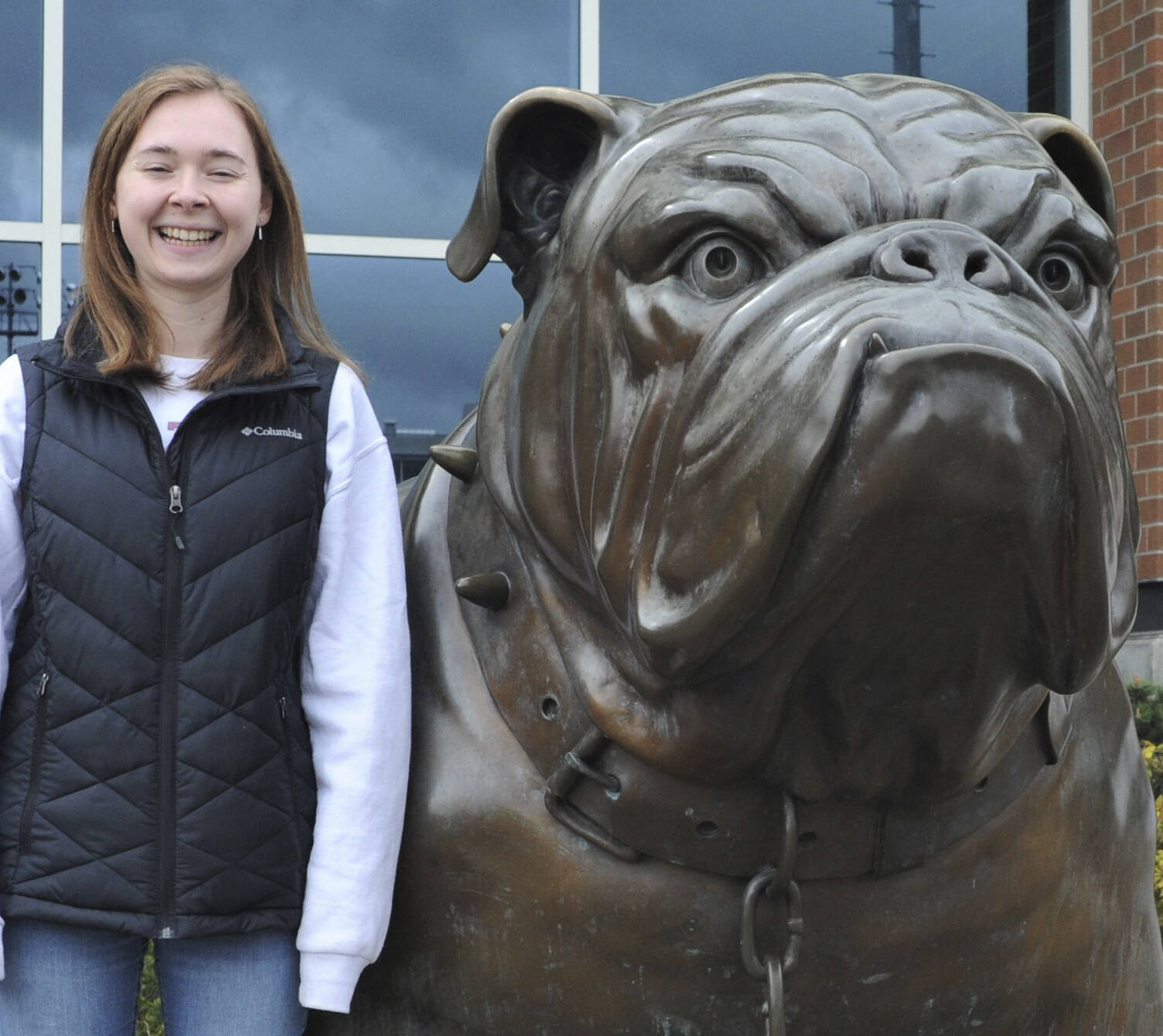 Madelyn Archibald with Spike the Gonzaga Bulldog at the Gonzaga University campus gymnasium where she plays saxophone in the Gonzaga pep band. Submitted photo