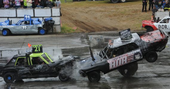One car was forced upon a barrier Monday afternoon at the Tillicum Park Arena during the annual Demo Derby. Photo by Lonnie Archibald