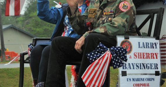 Larry and Sherry Baysinger were the Hometown Heroes for the 2022 Forks Old Fashioned 4th of July parade and rode aboard the float down Forks Avenue. Larry is a Vietnam Veteran, VFW member, and Purple Heart recipient. He and Sherry also donate their time to the Back Country Horseman Association and work to maintain backcountry trails so that all can enjoy them. Photos by Lonnie Archibald