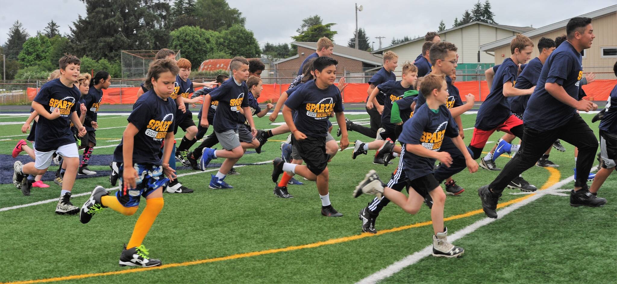 No sport could begin without calisthenics so these Spartan hopefuls were off and running you see. It was learned that it was one big football family as was expressed by Coach Highfield.