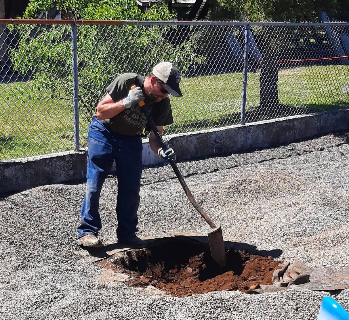 Public Works employee Mike Hirsch prepares the area for the new equipment. Submitted photo
