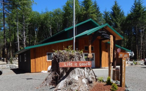 This building sits as you enter the new campground. Eventually, it will be open as a retail space. In his spare time, Buonpane likes to carve and create wooden items and other things, which he will offer for sale as well as a place for tourist information publications. The stump featured out front is chared a bit from the Great Forks Fire of 1951 which took this path as it headed for Forks! Check out hipcamp.com for more information. Photos Christi Baron