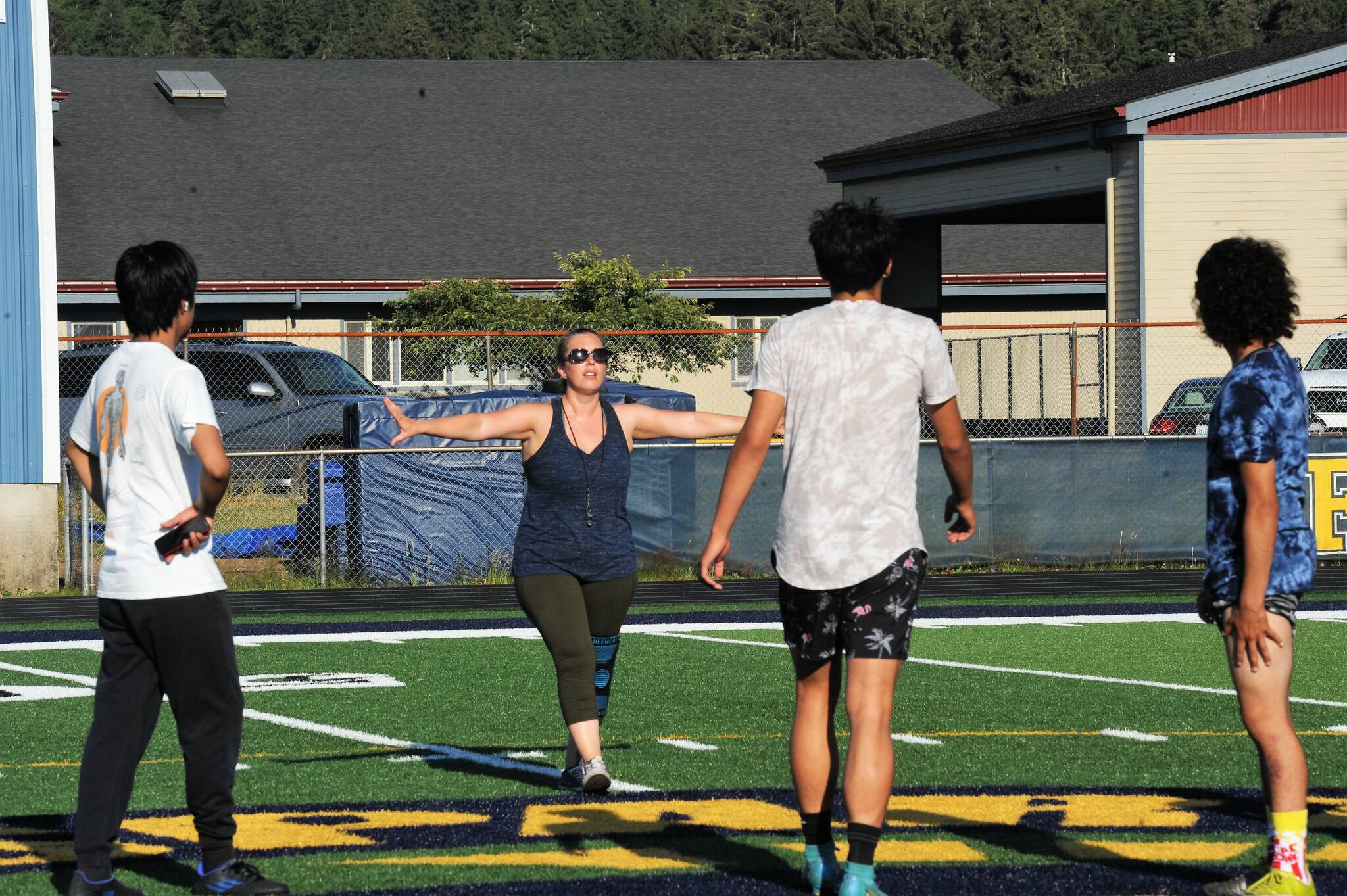 Forks High school girls soccer coach Tracy Gillett instructs practice. Photo by Lonnie Archibald