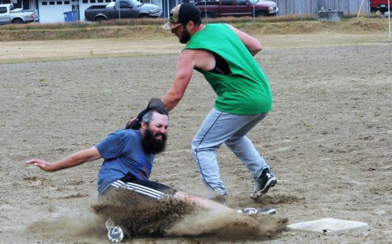 Dayne Brown of Team Gramps was called safe at third as Mossquatch third baseman David Hurn made the tag. Gramps took this contest 21 to 11.