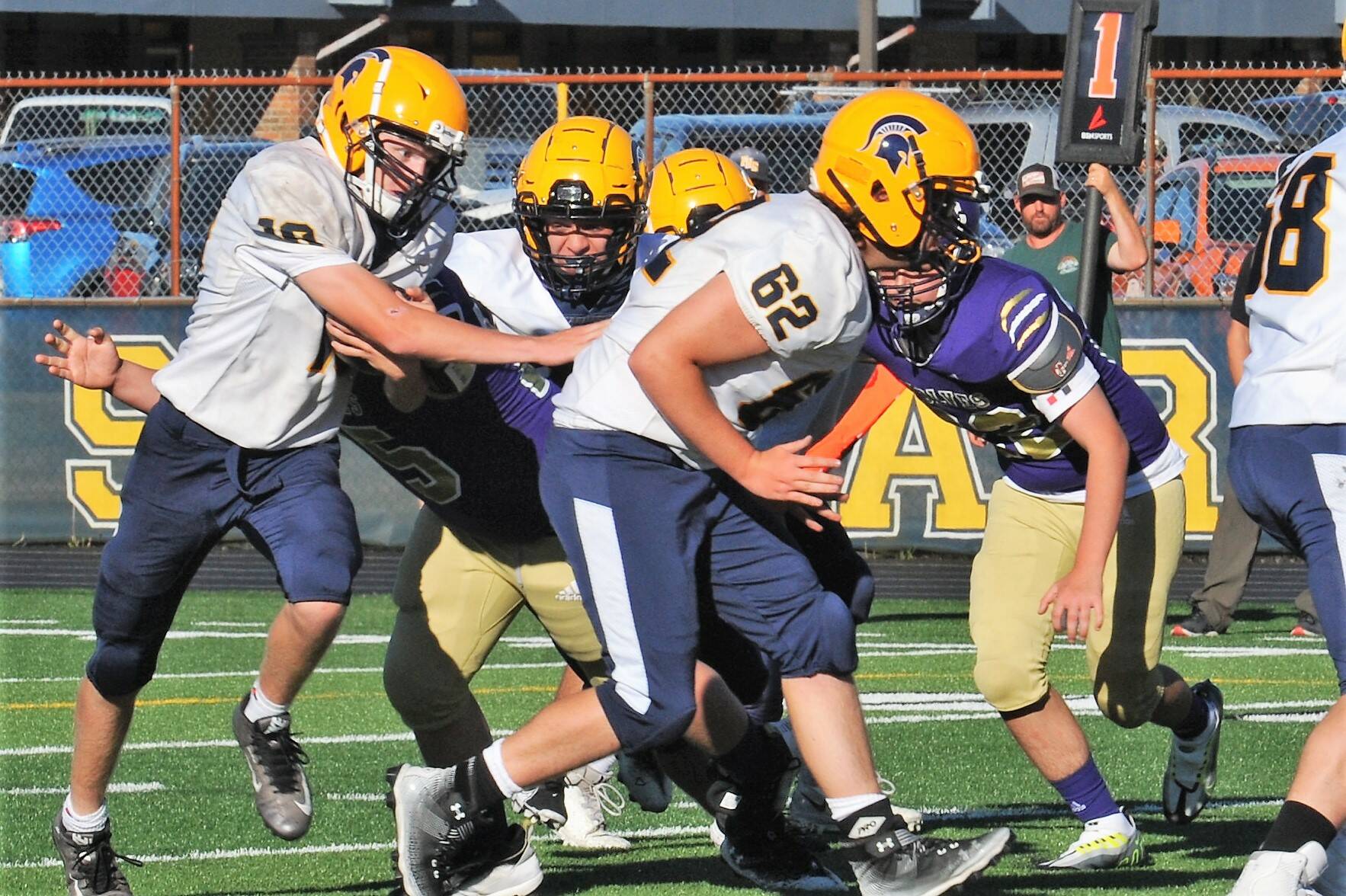In JV action Forks defeated Sequim 38 to 0 on Tuesday, Sept. 6 on the Spartan Turf under sunny weather. Pictured here Spartan Landen Olson (10) scores the extra points behind the blocking of Robert Lohneis (62). Photo by Lonnie Archibald