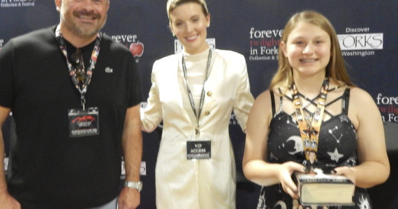 A dad and daughter with Maggie Grace. This dad said what made him happy was the smile on his daughter’s face. Photos Christi Baron