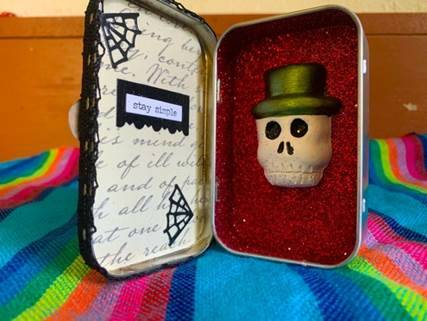 Create your own tin box diorama to honor a departed loved one.