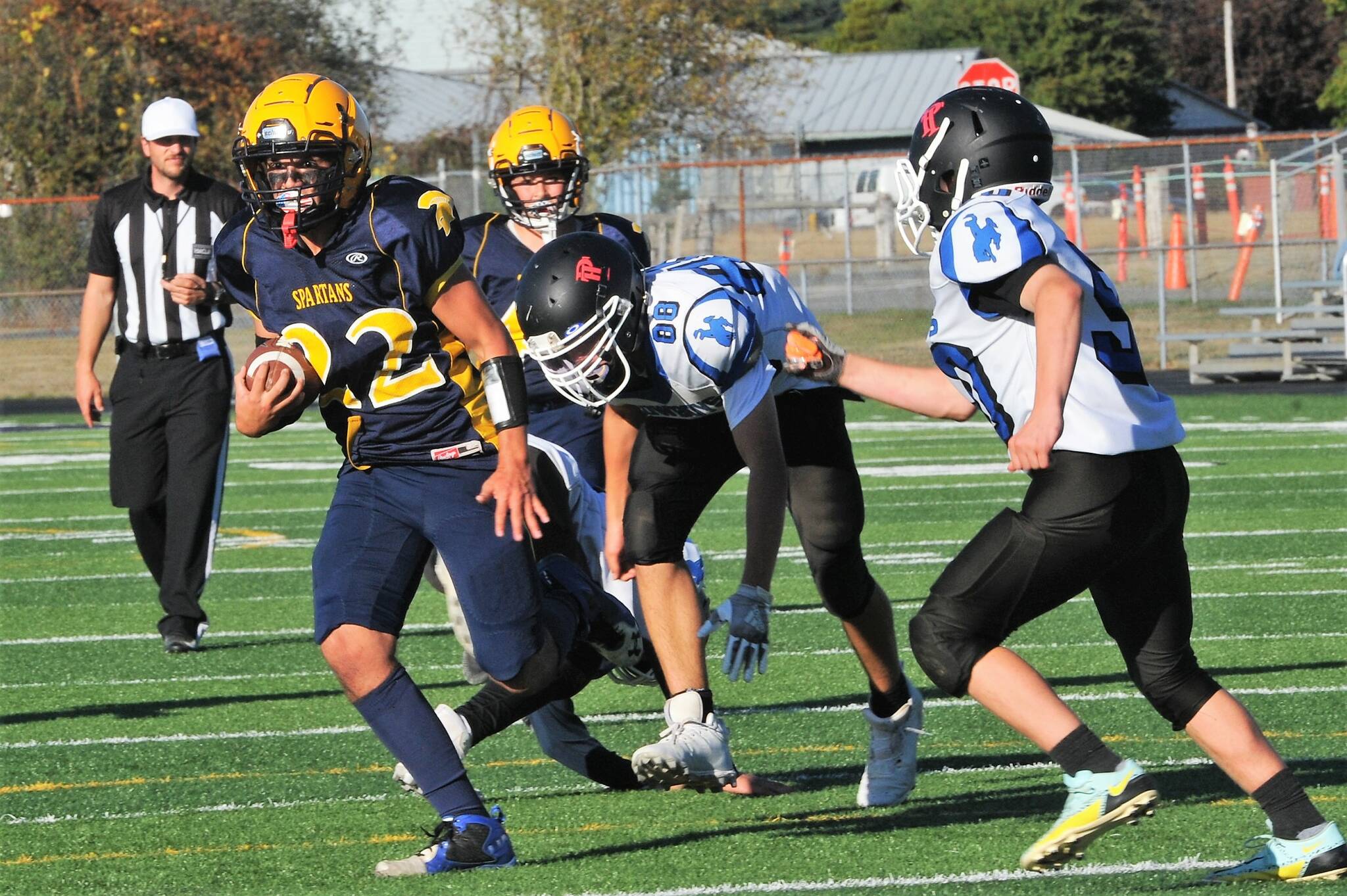 Highfield breaks tackles.