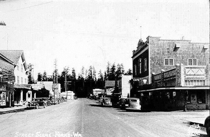 A view of Olympic Pharmacy and the IOOF Hall around the 1930s.