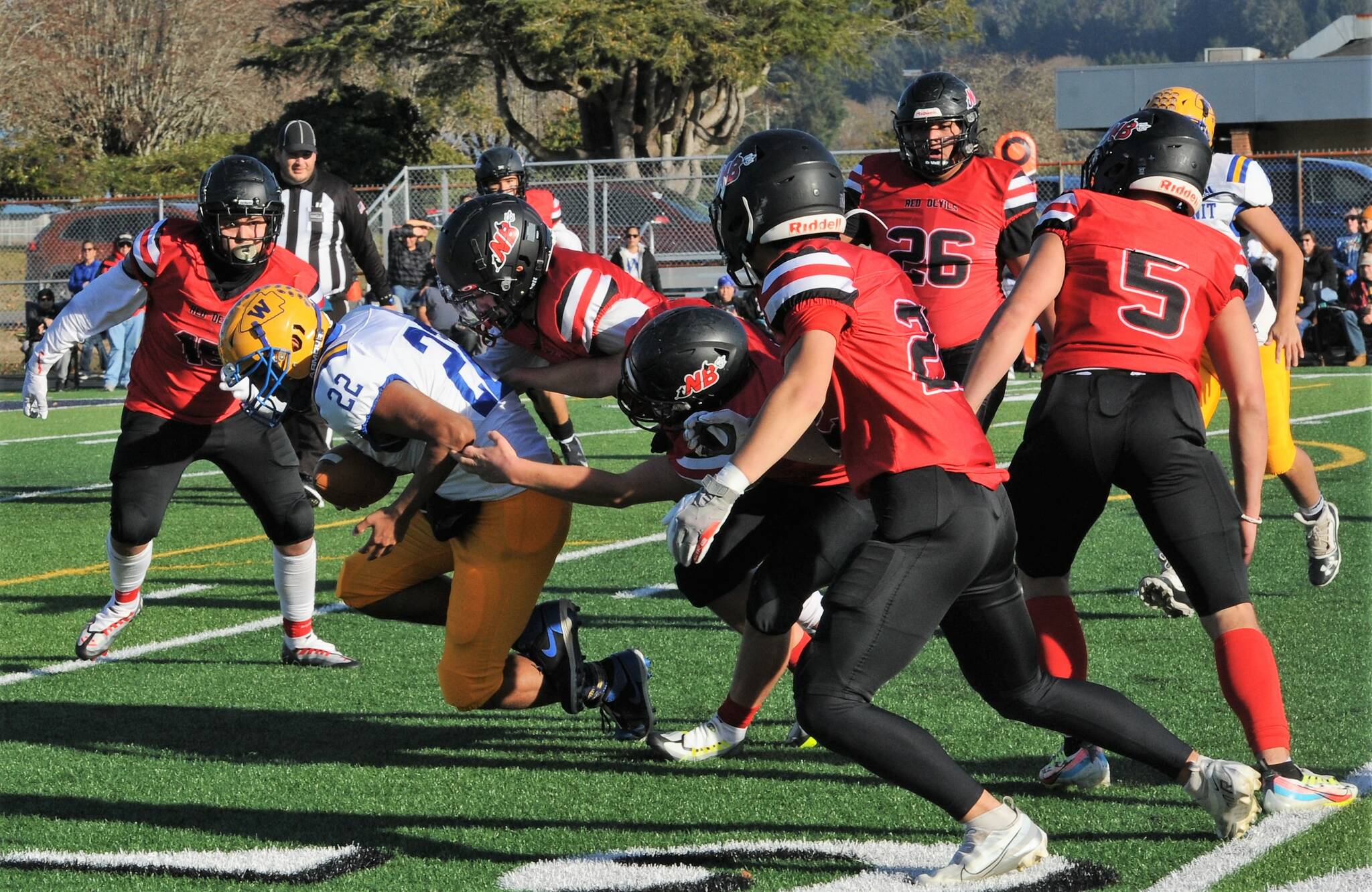 Red Devil’s gang tackling.