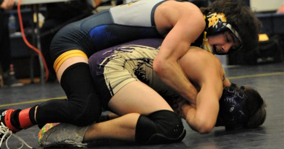 Spartan Mathew Montes defeated Beauregard of Sequim 9 to 0 in the 113 lb class. Photos Lonnie Archibald